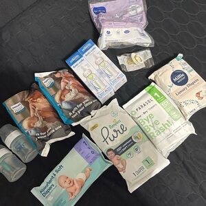 Assorted Baby Diapers and Bottles